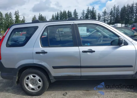 2006 Honda Cr-V Lx z USA, uszkodzony, nr VIN JHLRD78586C062616